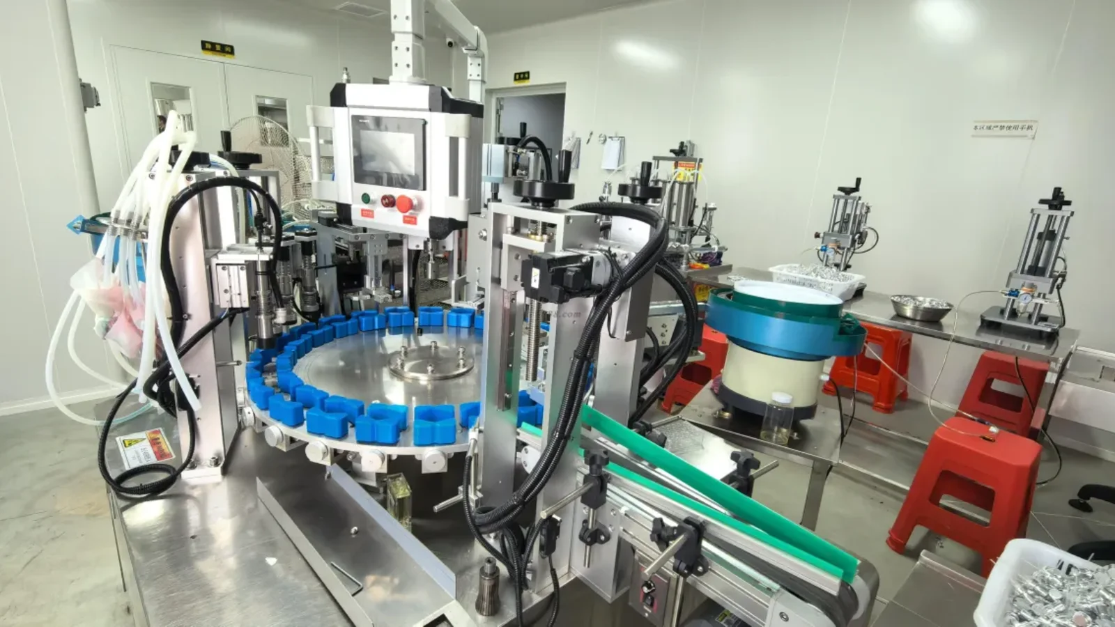 Perfume bottles moving through the filling and assembly line, relevant to perfume raw material procurement time