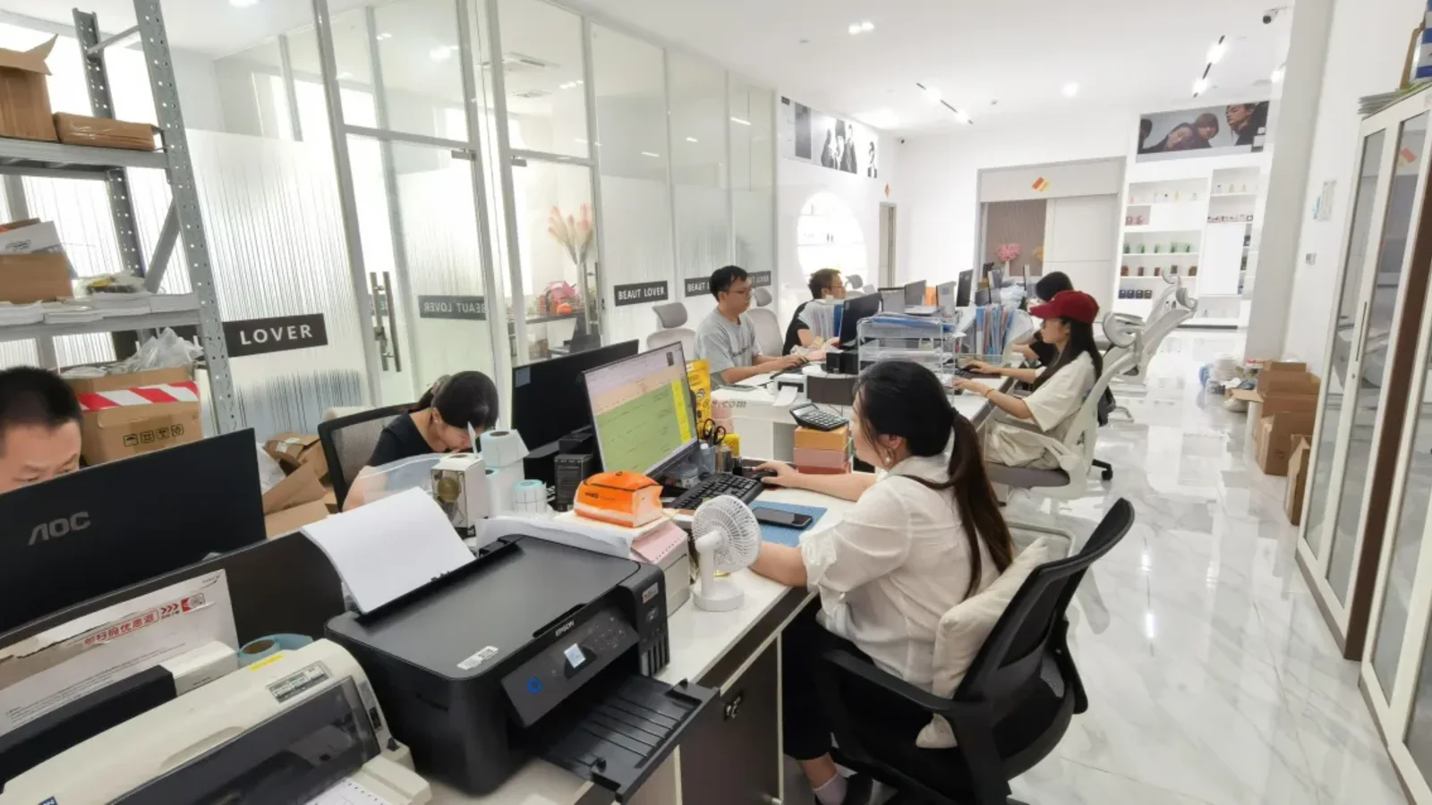 Factory project team reviewing a perfume manufacturing brief, relevant to perfume RFQ checklist