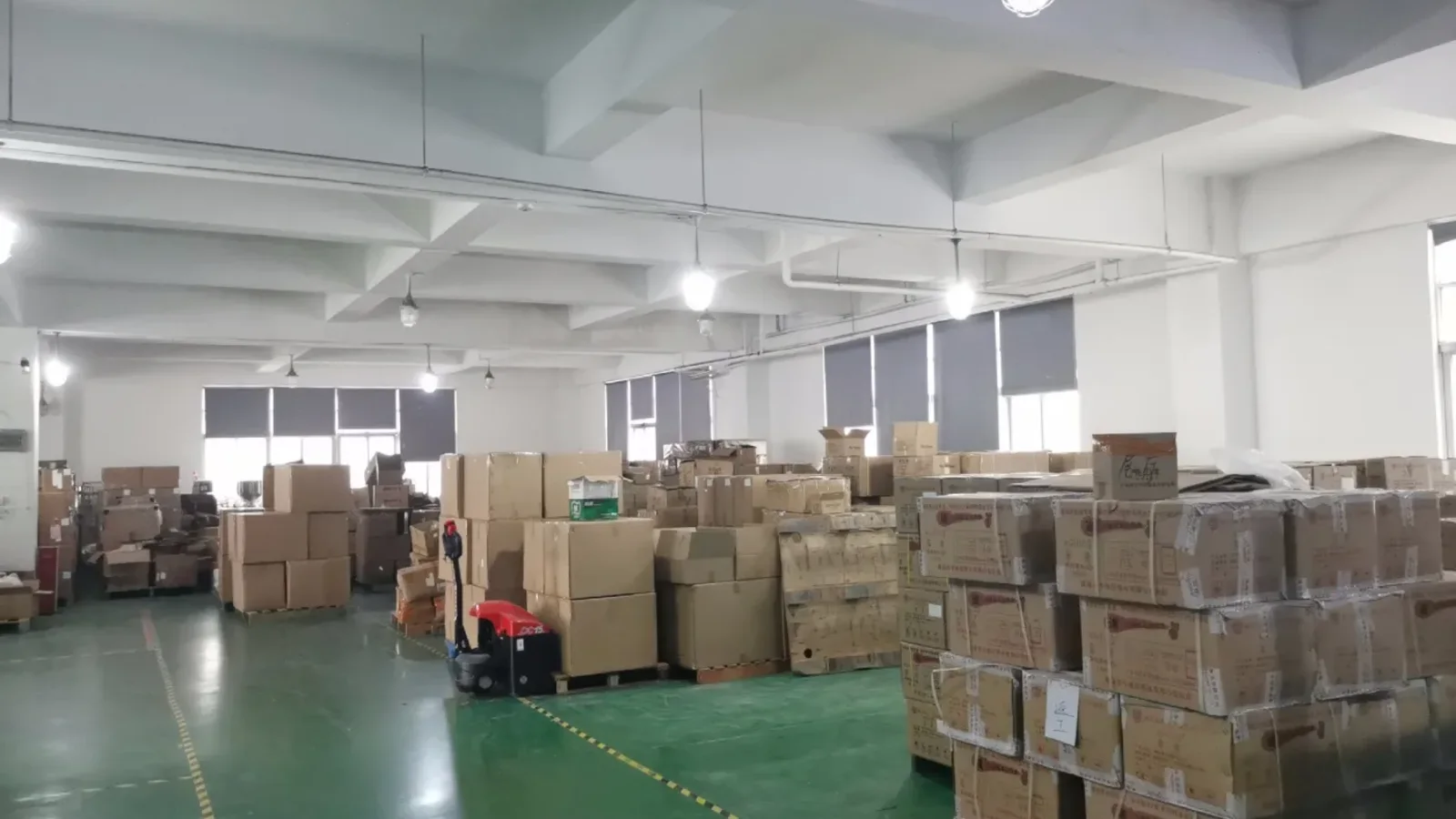 Perfume components and export cartons organized in the warehouse, relevant to import perfume from China